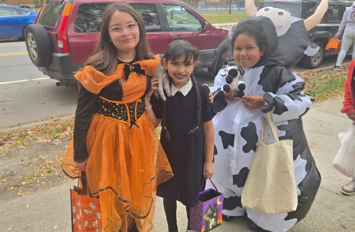  3 Girls posing in costumes